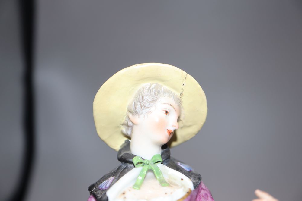 A Meissen style figure of a lady, height 19cm, and a biscuit bust of Shakespeare,